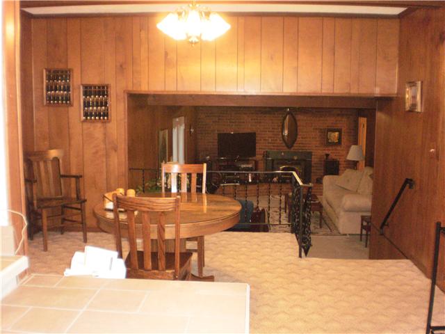 535 Rural Hill Road Nashville, TN 37217 - Photo 10 of 20 Dining room area. New French doors in '10 - the ones with blinds built inside. The doors to left of this table leads out back to the concrete patio. Easy setup for grilling and serving guest - absolutely great layout for mingling. Come see...