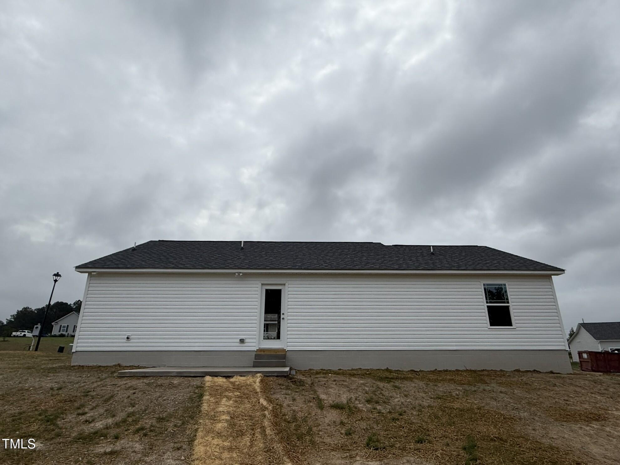 146 Starry Sky Drive Benson, NC 27504 - Photo 15 of 16 a house with a outdoor space