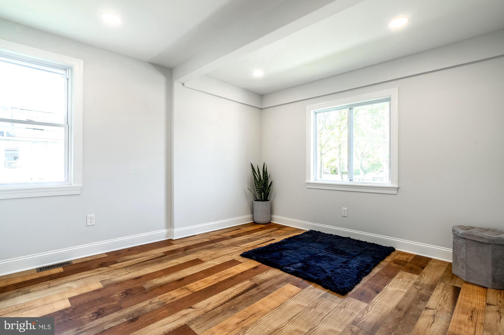 27 Cherry Avenue Maple Shade, NJ 08052 - Photo 15 of 50 a bedroom with a bed and a window