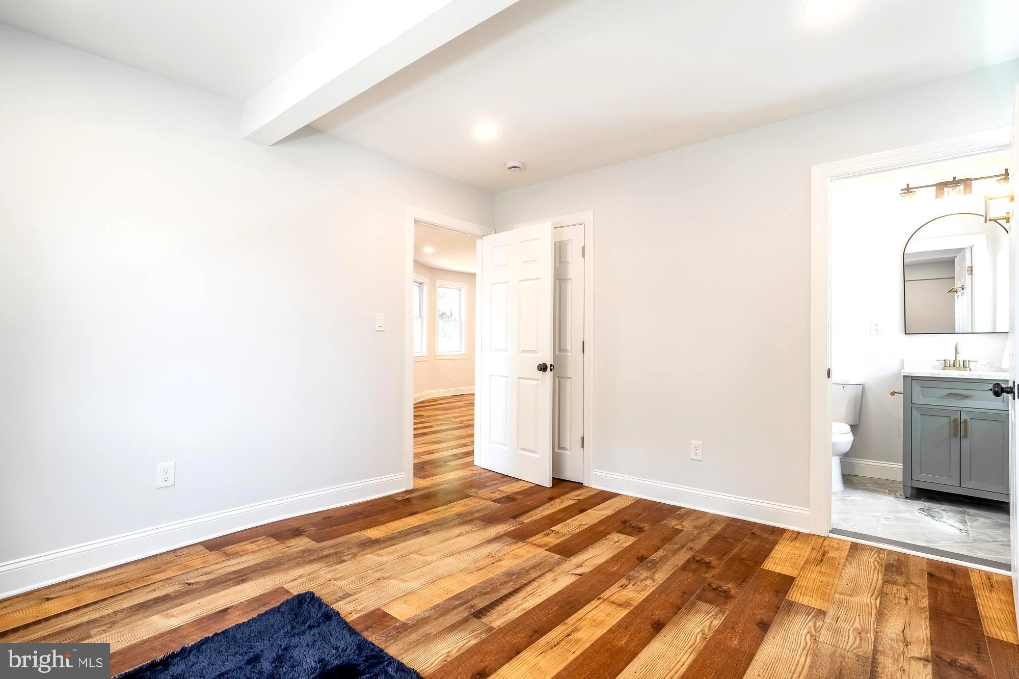 27 Cherry Avenue Maple Shade, NJ 08052 - Photo 16 of 50 a view of a bedroom with wooden floor