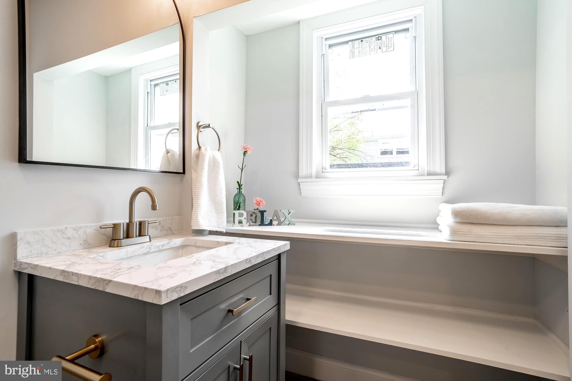 27 Cherry Avenue Maple Shade, NJ 08052 - Photo 18 of 50 a view of a sink and a mirror