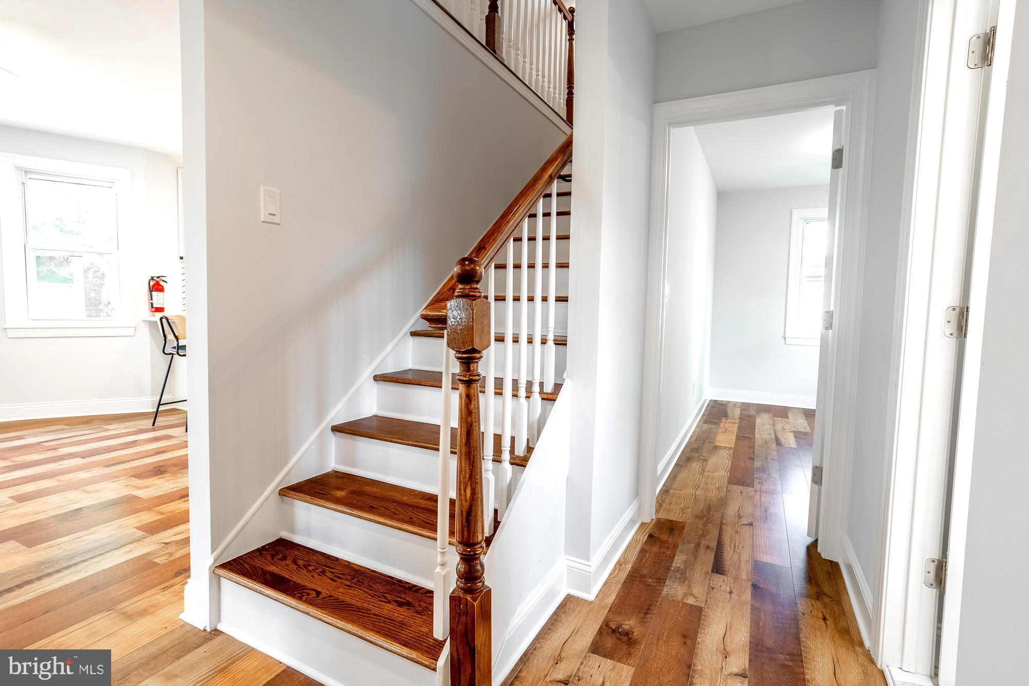 27 Cherry Avenue Maple Shade, NJ 08052 - Photo 19 of 50 a view of staircase with wooden floor and white walls