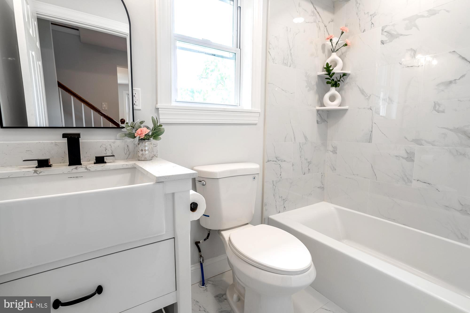 27 Cherry Avenue Maple Shade, NJ 08052 - Photo 20 of 50 a bathroom with a sink toilet and shower