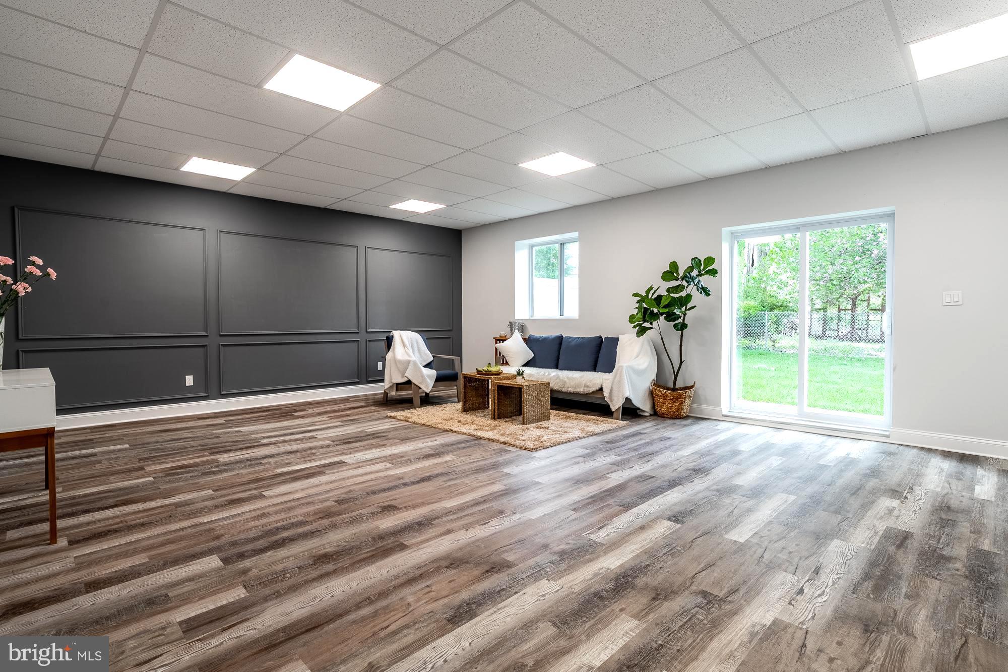 27 Cherry Avenue Maple Shade, NJ 08052 - Photo 37 of 50 a spacious bedroom with a large bed and a window