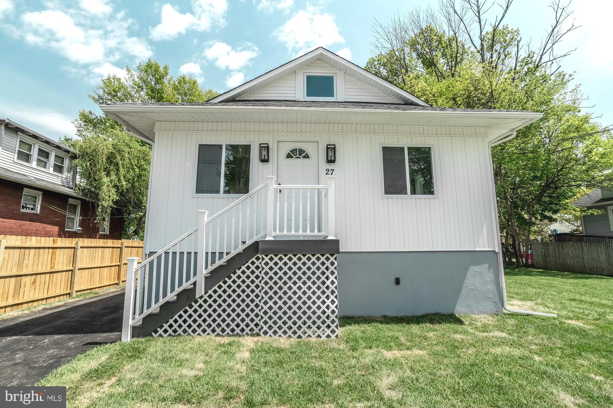 27 Cherry Avenue Maple Shade, NJ 08052 - Photo 4 of 50 a front view of a house with a yard