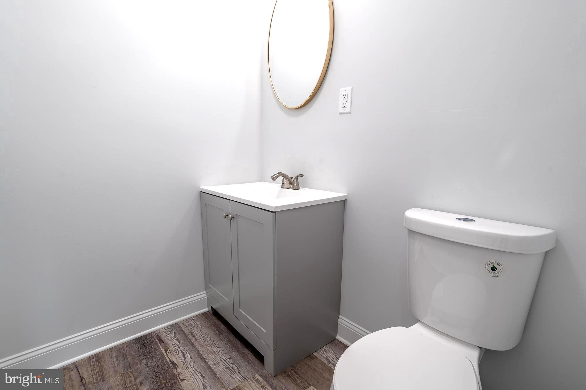 27 Cherry Avenue Maple Shade, NJ 08052 - Photo 40 of 50 a bathroom with a sink and a toilet