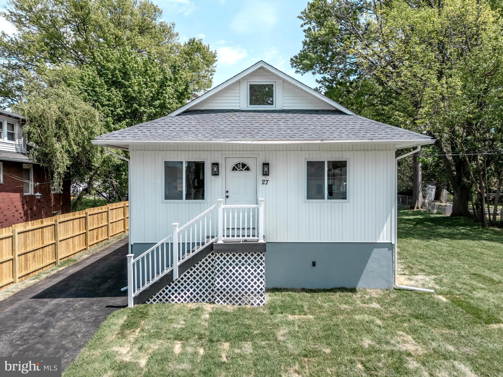 27 Cherry Avenue Maple Shade, NJ 08052 - Photo 45 of 50 a front view of a house with a yard