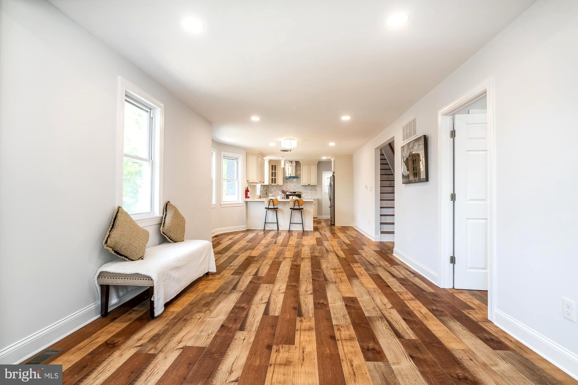 27 Cherry Avenue Maple Shade, NJ 08052 - Photo 7 of 50 a spacious bedroom with a bed and a couch