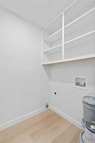 a view of room with racks on the wall