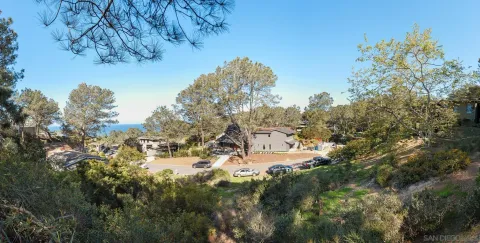 a view of a houses with a yard