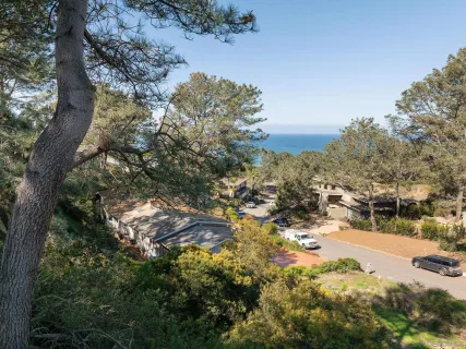 a view of ocean and mountain