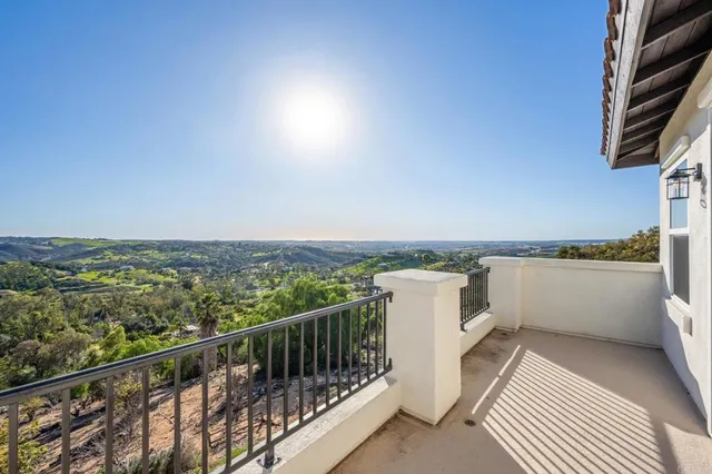 a large bathroom with a large tub and sink
