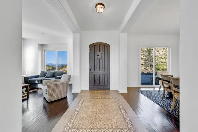a view of an outdoor sitting area with furniture