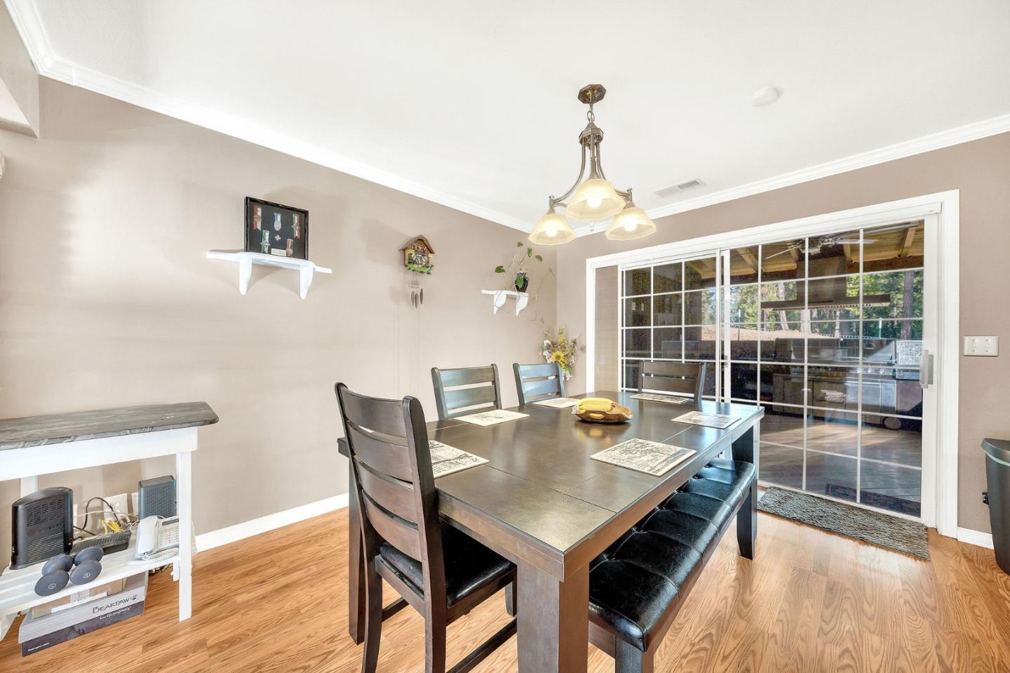 26161 Sugar Pine Drive Pioneer, CA 95666 - Photo 11 of 57 a view of a dining room with furniture window and wooden floor