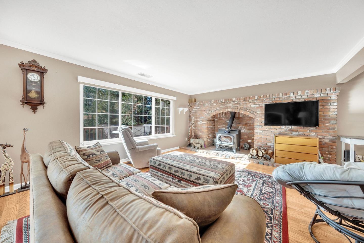 26161 Sugar Pine Drive Pioneer, CA 95666 - Photo 4 of 57 a bedroom with a bed and glass wall