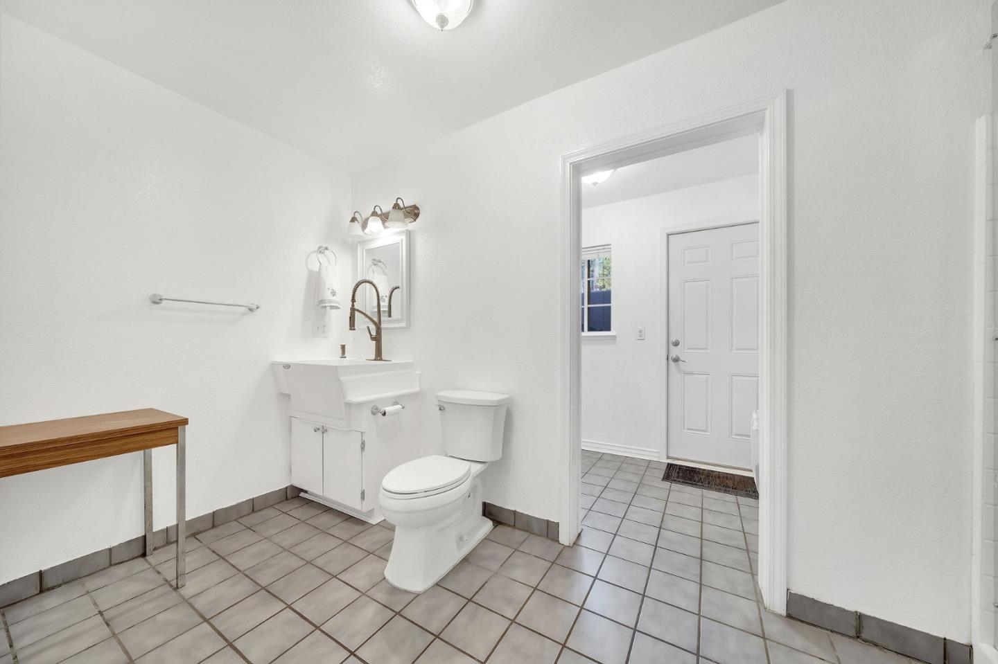 26161 Sugar Pine Drive Pioneer, CA 95666 - Photo 50 of 57 a bathroom with a toilet a sink and mirror