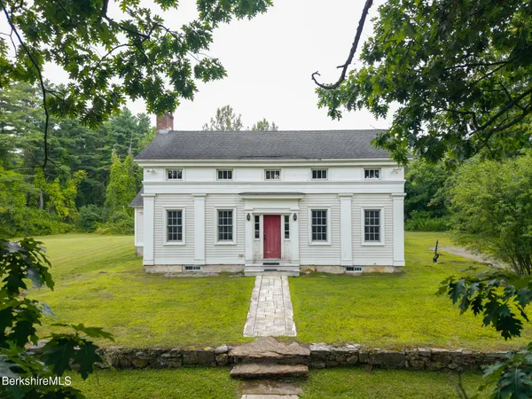 a view of a house with a swimming pool