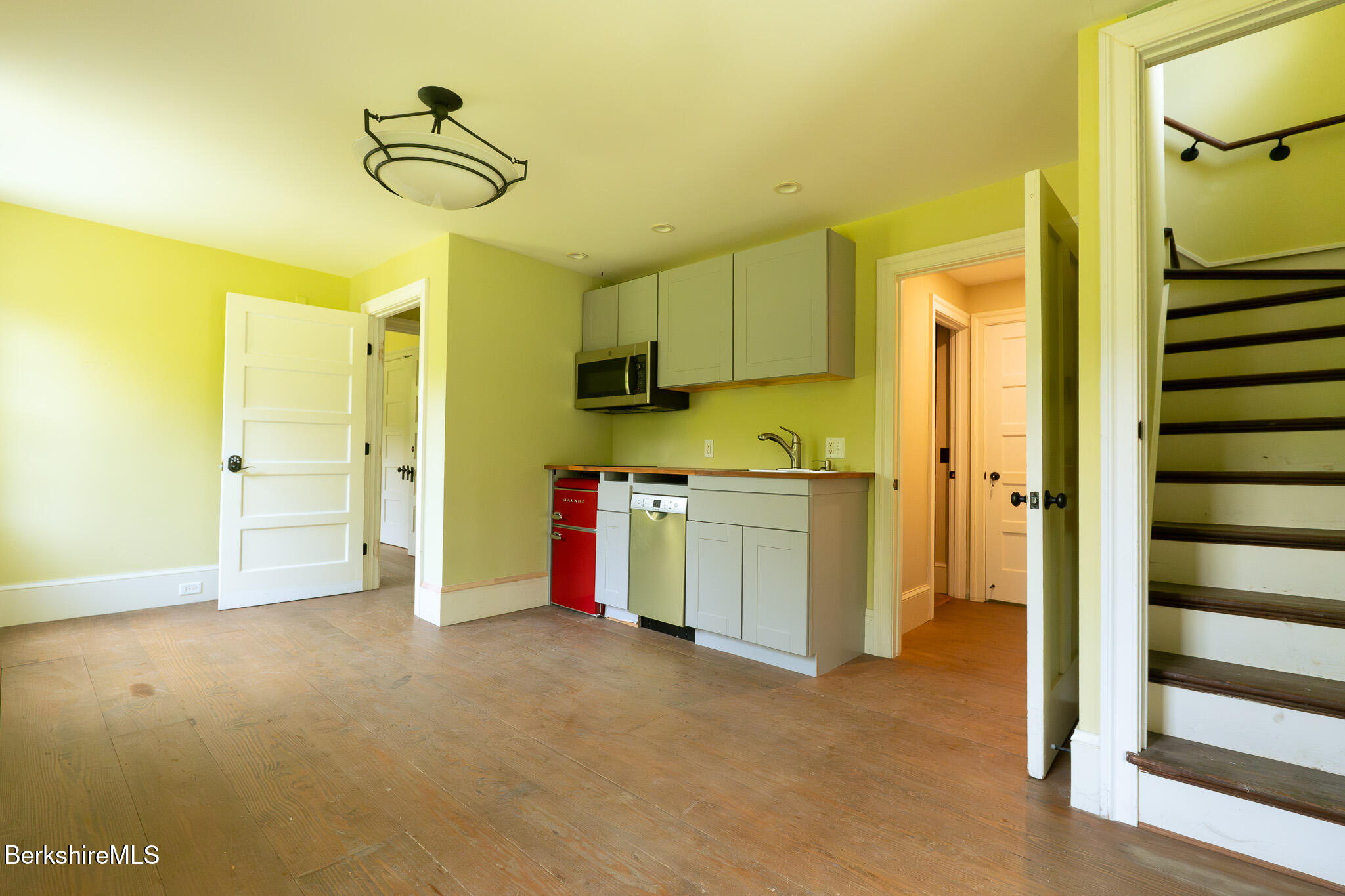 560 Stockbridge Road Lee, MA 01238 - Photo 38 of 48 a view of a room with air conditioner duct and windows