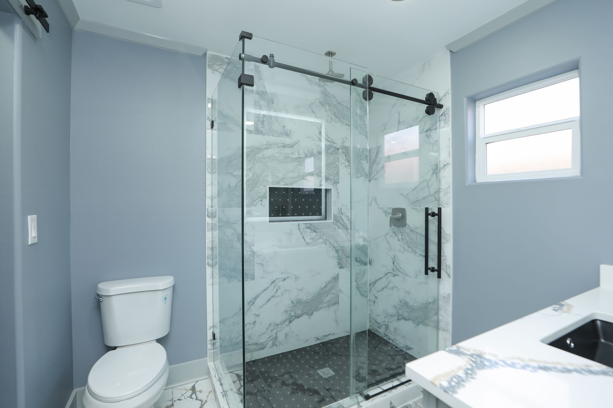 4047 Juliet Street Houston, TX 77087 - Photo 24 of 38 a bathroom with a toilet and shower