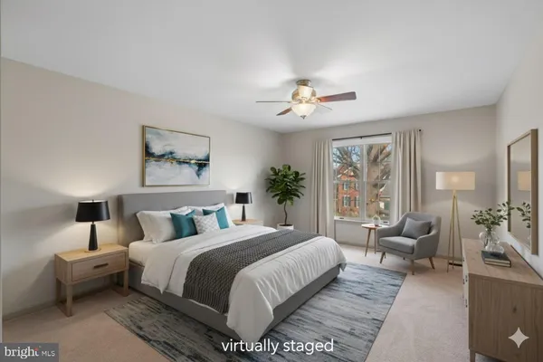 a bedroom with a bed and furniture