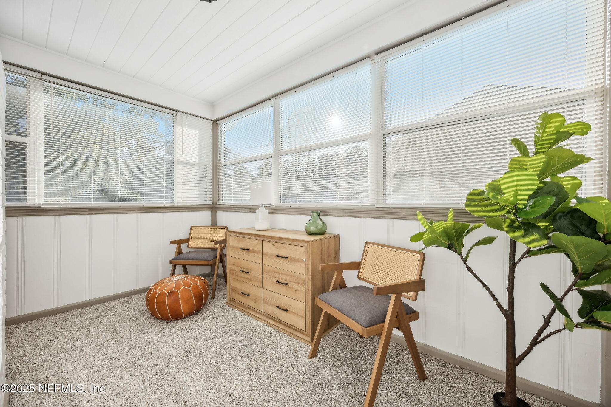 4615 Woolman Avenue Jacksonville, FL 32205 - Photo 13 of 34 a room with furniture and a potted plant