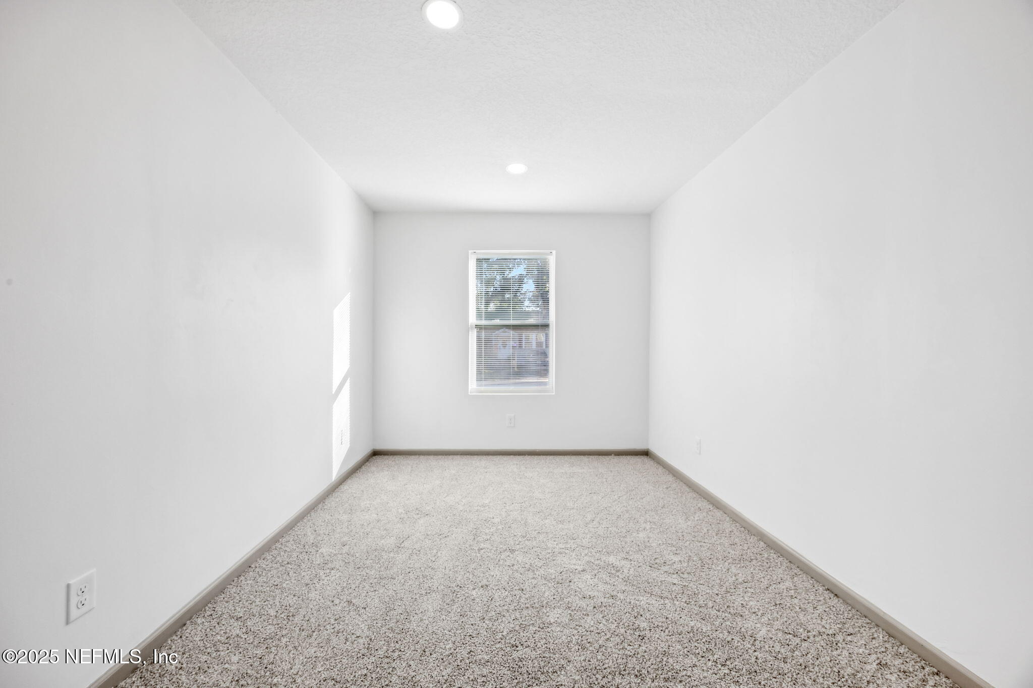4615 Woolman Avenue Jacksonville, FL 32205 - Photo 24 of 34 an empty room with windows