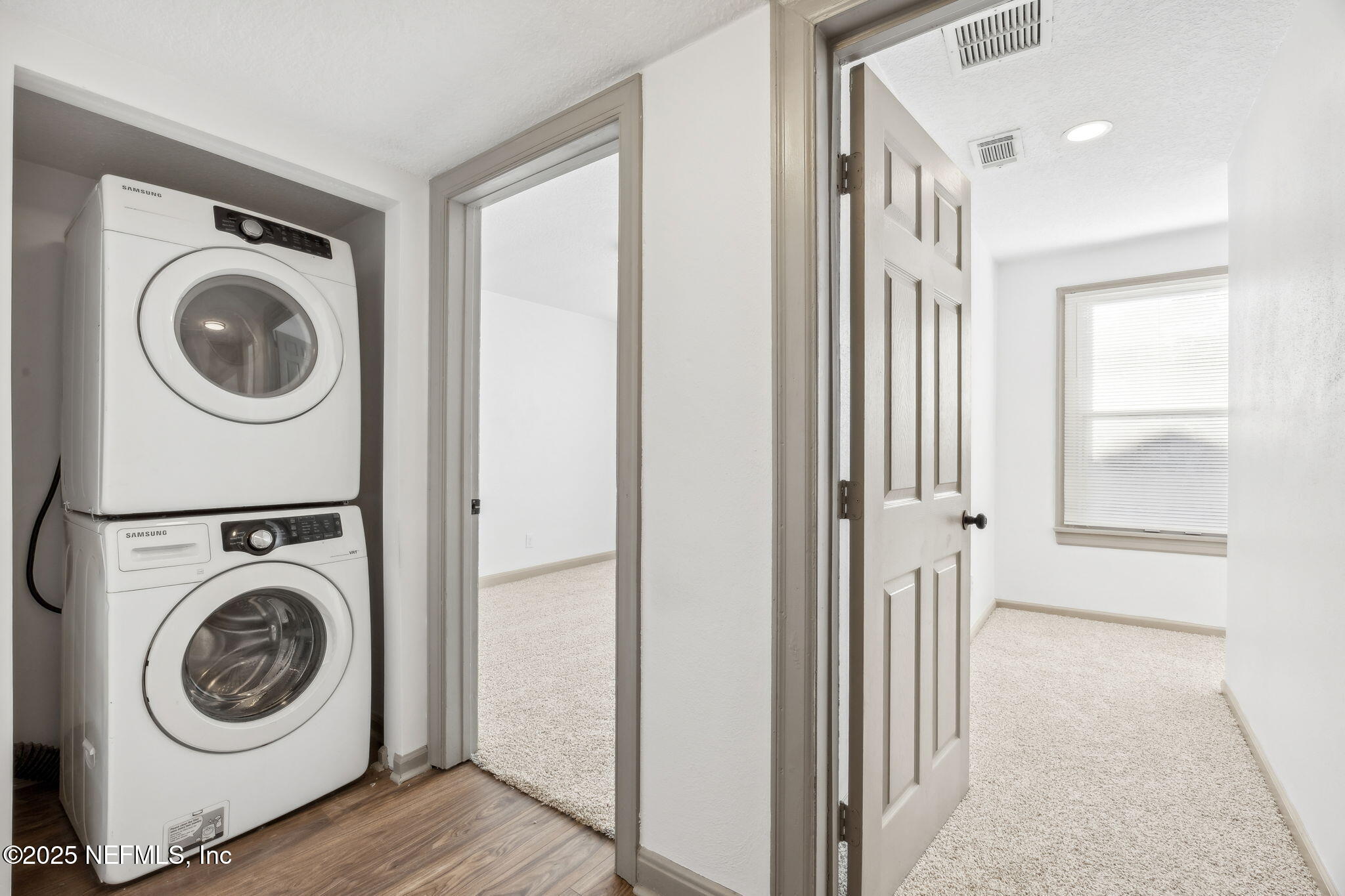 4615 Woolman Avenue Jacksonville, FL 32205 - Photo 29 of 34 a view of a hallway with washer and dryer