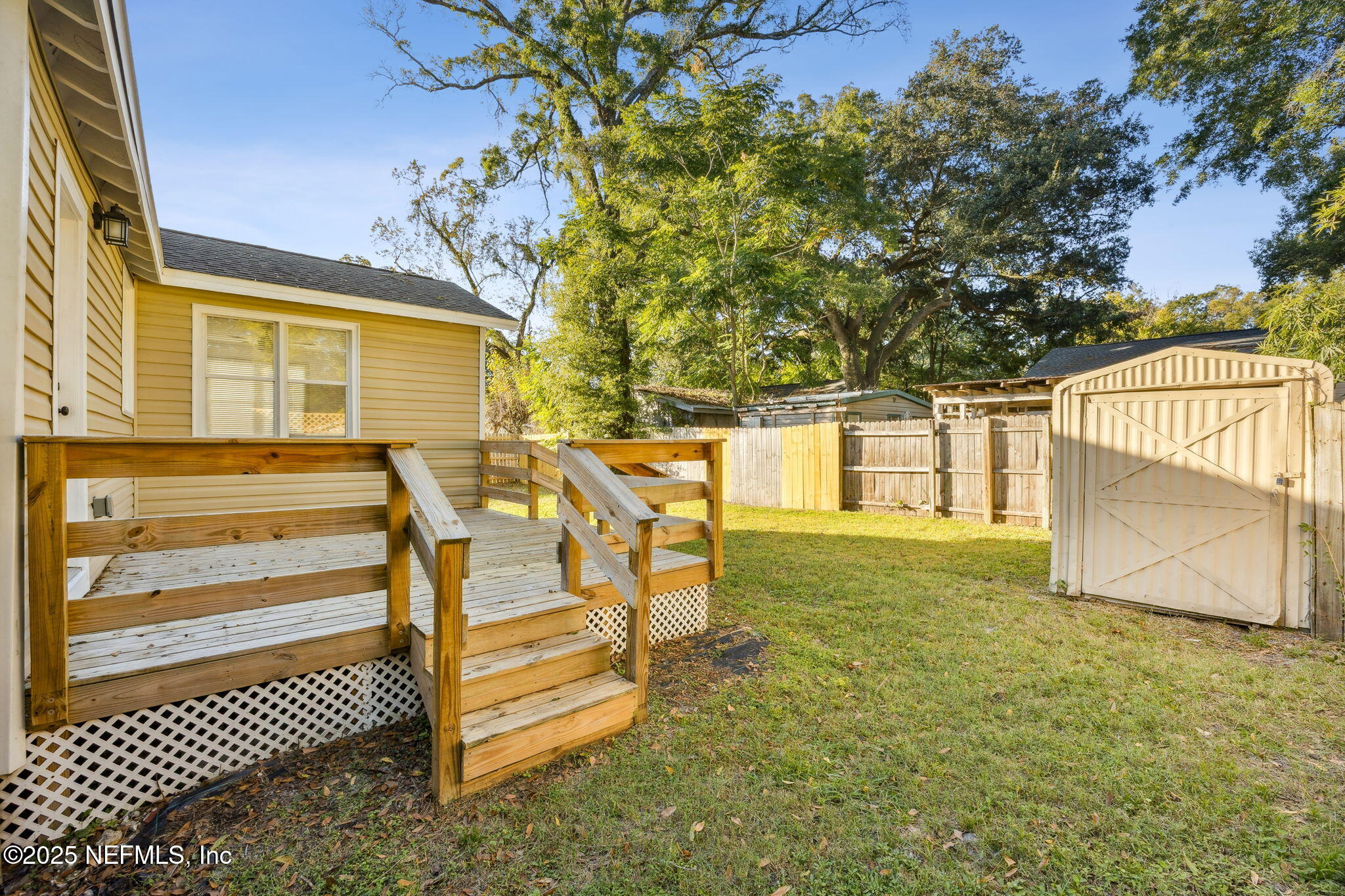 4615 Woolman Avenue Jacksonville, FL 32205 - Photo 32 of 34 a view of outdoor space and deck