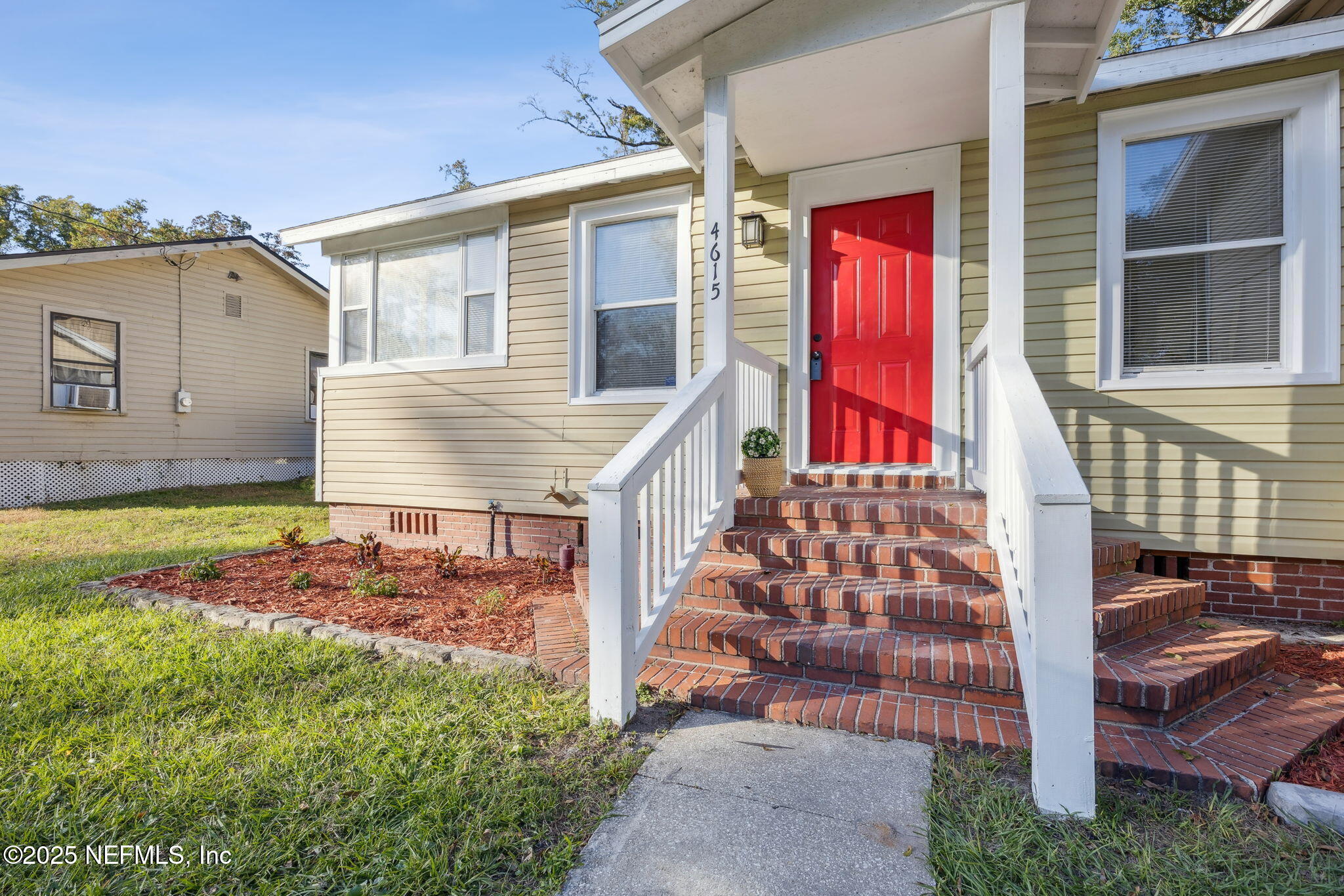 4615 Woolman Avenue Jacksonville, FL 32205 - Photo 5 of 34 a view of a house with a balcony