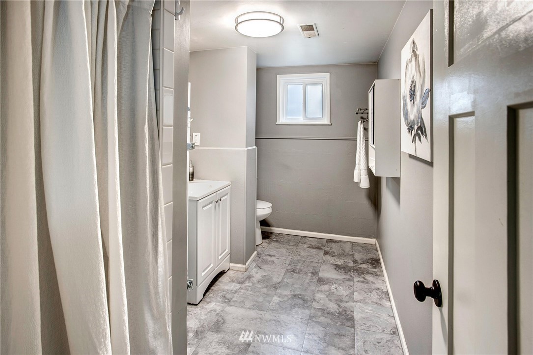 24326 Meridian Avenue South Bothell, WA 98021 - Photo 30 of 40 a bathroom with a sink and toilet