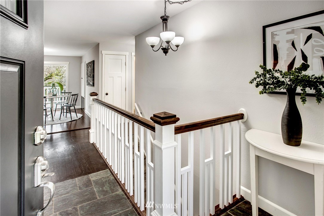24326 Meridian Avenue South Bothell, WA 98021 - Photo 3 of 40 a view of a hallway to a livingroom with furniture