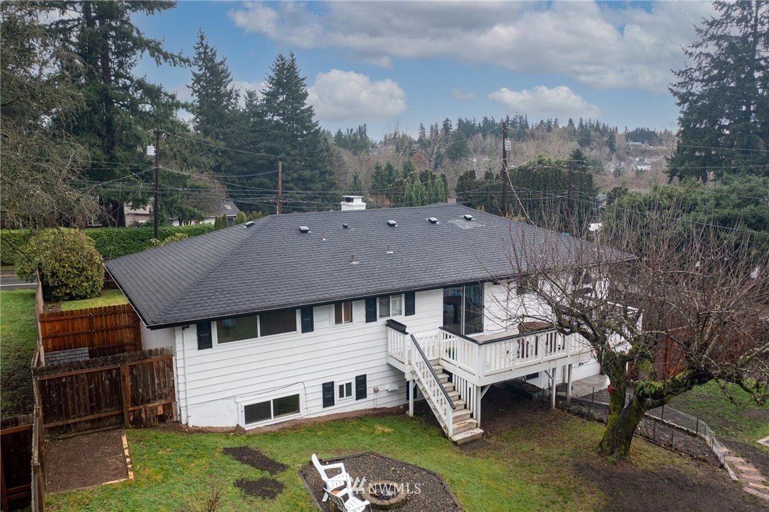 24326 Meridian Avenue South Bothell, WA 98021 - Photo 34 of 40 a aerial view of a house with a yard table and chairs