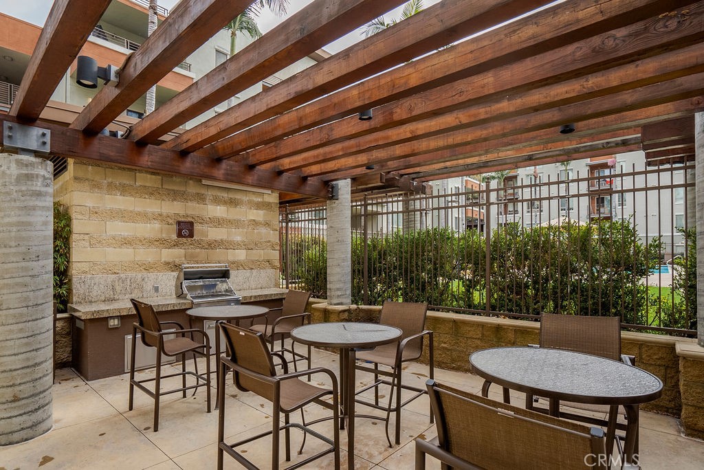 100 South Alameda Street, Unit 213 Los Angeles, CA 90012 - Photo 15 of 41 a view of a outdoor space with seating area