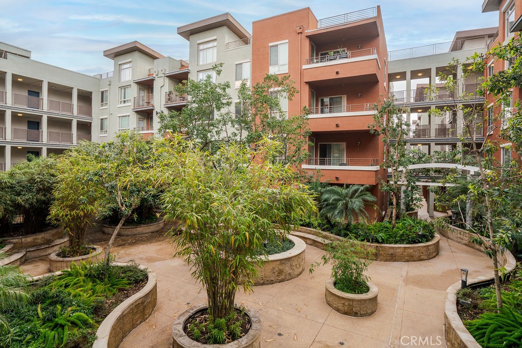 100 South Alameda Street, Unit 213 Los Angeles, CA 90012 - Photo 18 of 41 a view of a building with potted plants