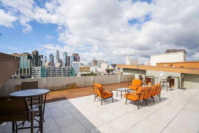 a view of a terrace with furniture
