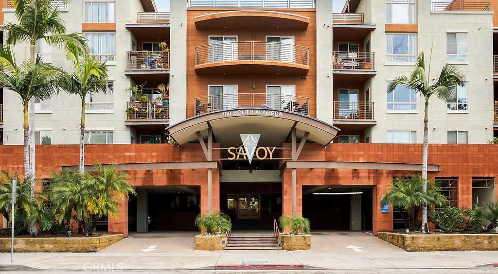 100 South Alameda Street, Unit 213 Los Angeles, CA 90012 - Photo 27 of 41 a front view of a building and garage