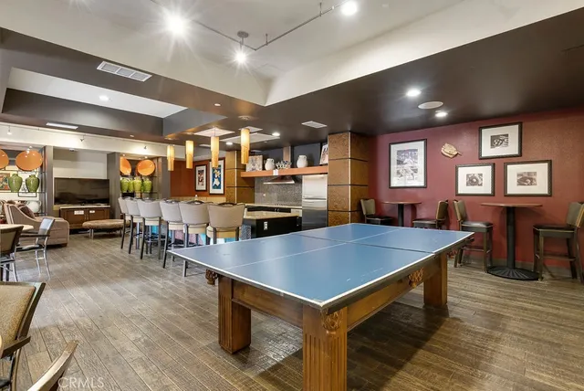 a view of a room with furniture and window