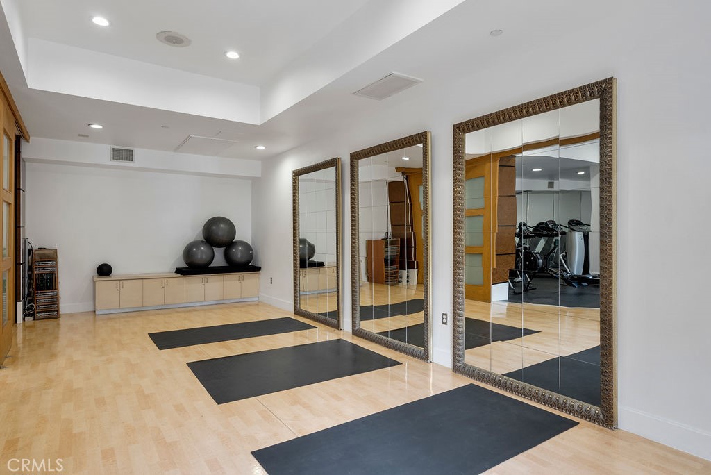 100 South Alameda Street, Unit 213 Los Angeles, CA 90012 - Photo 30 of 41 a view of a room with glass door and furniture