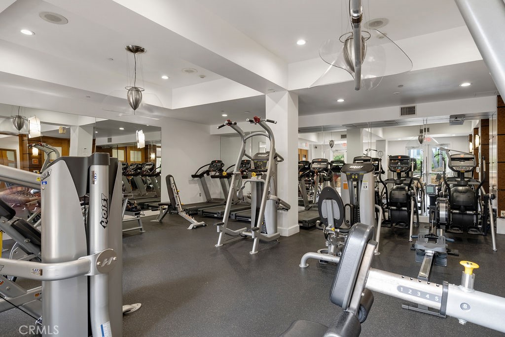 100 South Alameda Street, Unit 213 Los Angeles, CA 90012 - Photo 31 of 41 a view of a room with gym equipment