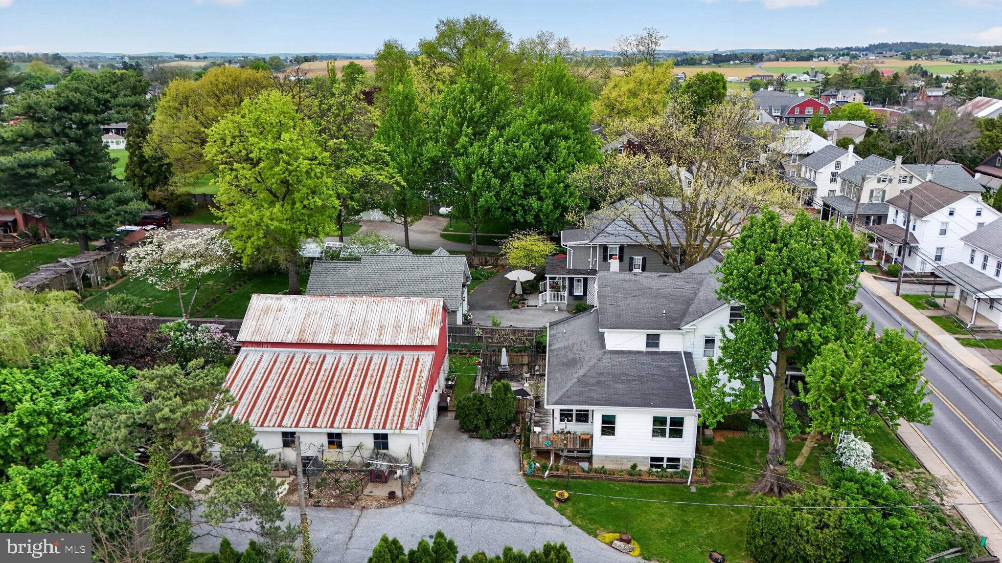 40 Queen Road Intercourse, PA 17529 - Photo 2 of 58 an aerial view of a house with garden space and street view