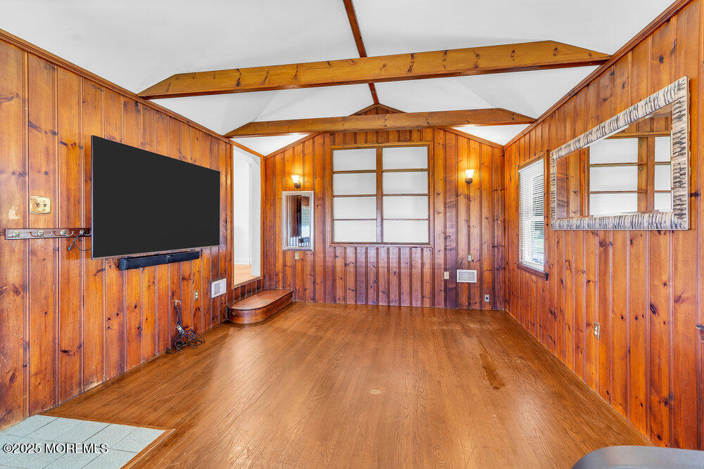 708 18th Avenue Lake Como, NJ 07719 - Photo 14 of 35 a view of a livingroom with furniture and a flat screen tv