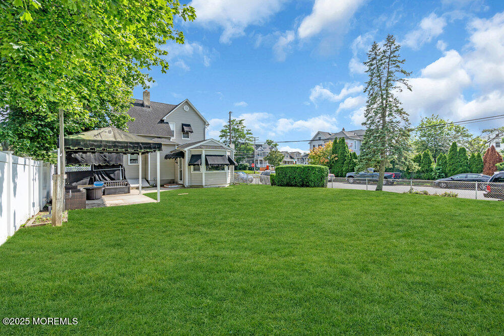 708 18th Avenue Lake Como, NJ 07719 - Photo 24 of 35 a front view of a house with garden