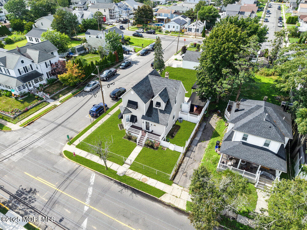 708 18th Avenue Lake Como, NJ 07719 - Photo 3 of 35 an aerial view of a house with a big yard and large trees