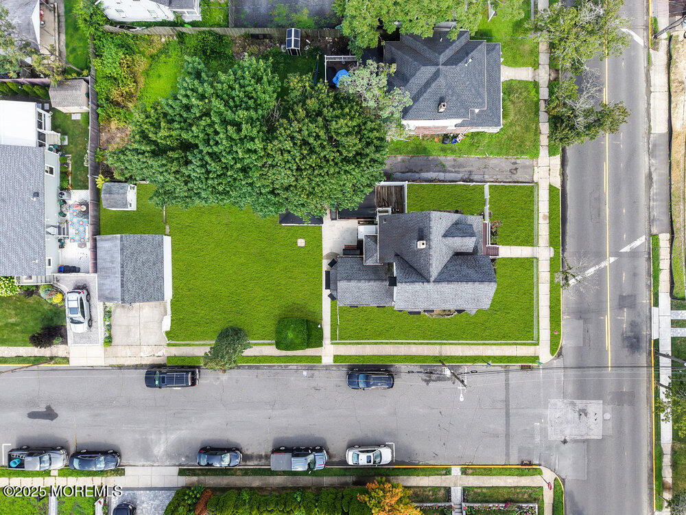 708 18th Avenue Lake Como, NJ 07719 - Photo 4 of 35 an aerial view of a house with a swimming pool