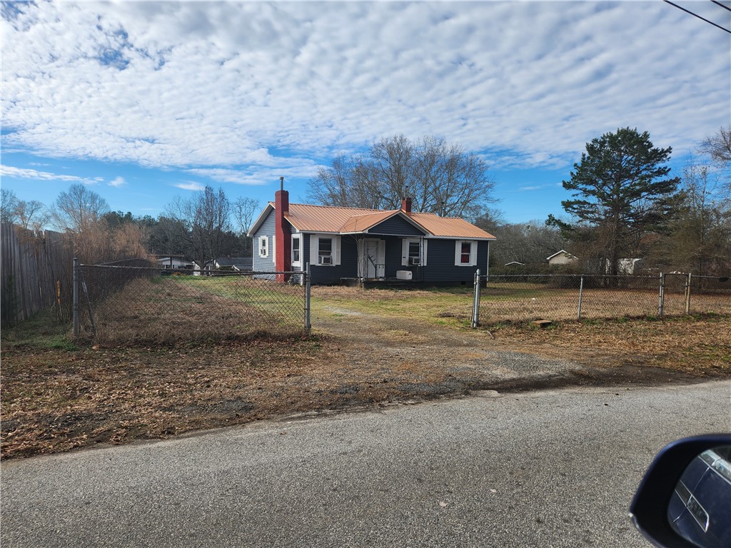 1326 Chiquola Avenue Honea Path, SC 29654 - Photo 1 of 15 This charming home offers a cozy retreat with a classic design and inviting curb appeal.