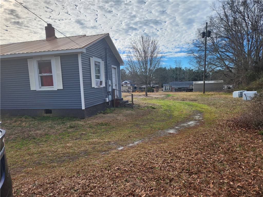 1326 Chiquola Avenue Honea Path, SC 29654 - Photo 3 of 15 This charming home offers a cozy retreat with ample outdoor space.