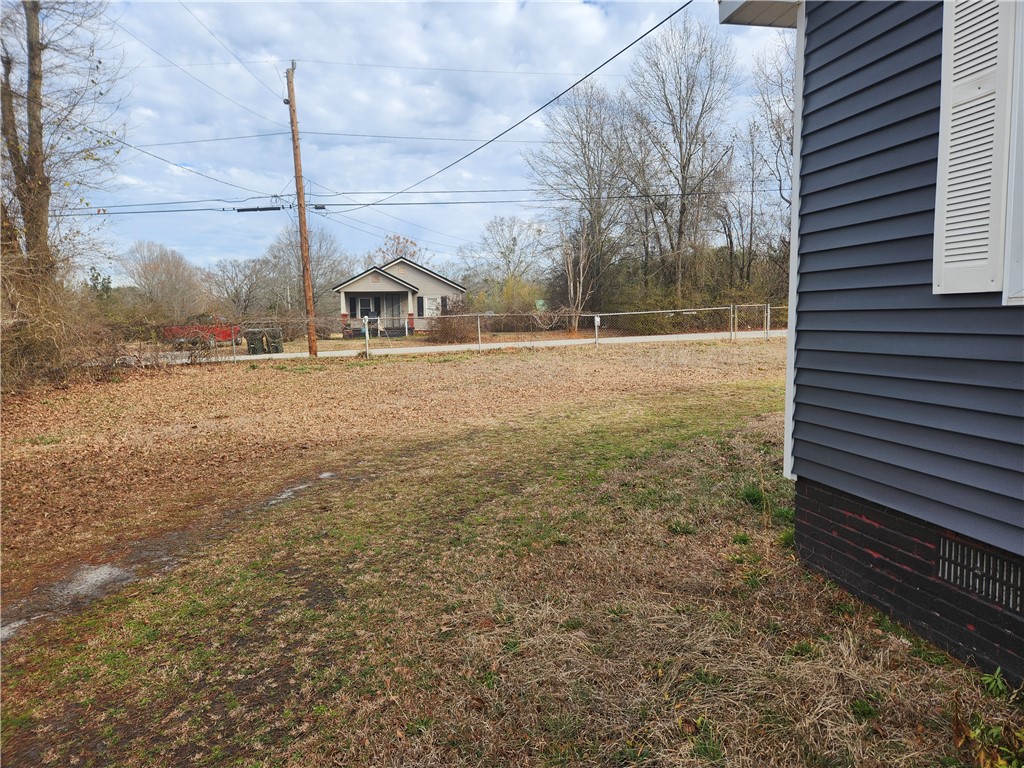 1326 Chiquola Avenue Honea Path, SC 29654 - Photo 4 of 15 This charming property features durable siding, offering both aesthetic appeal and lasting protection.