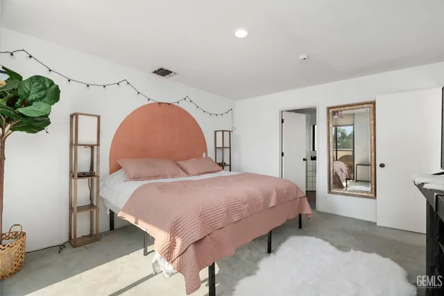 a view of a balcony with wooden floor