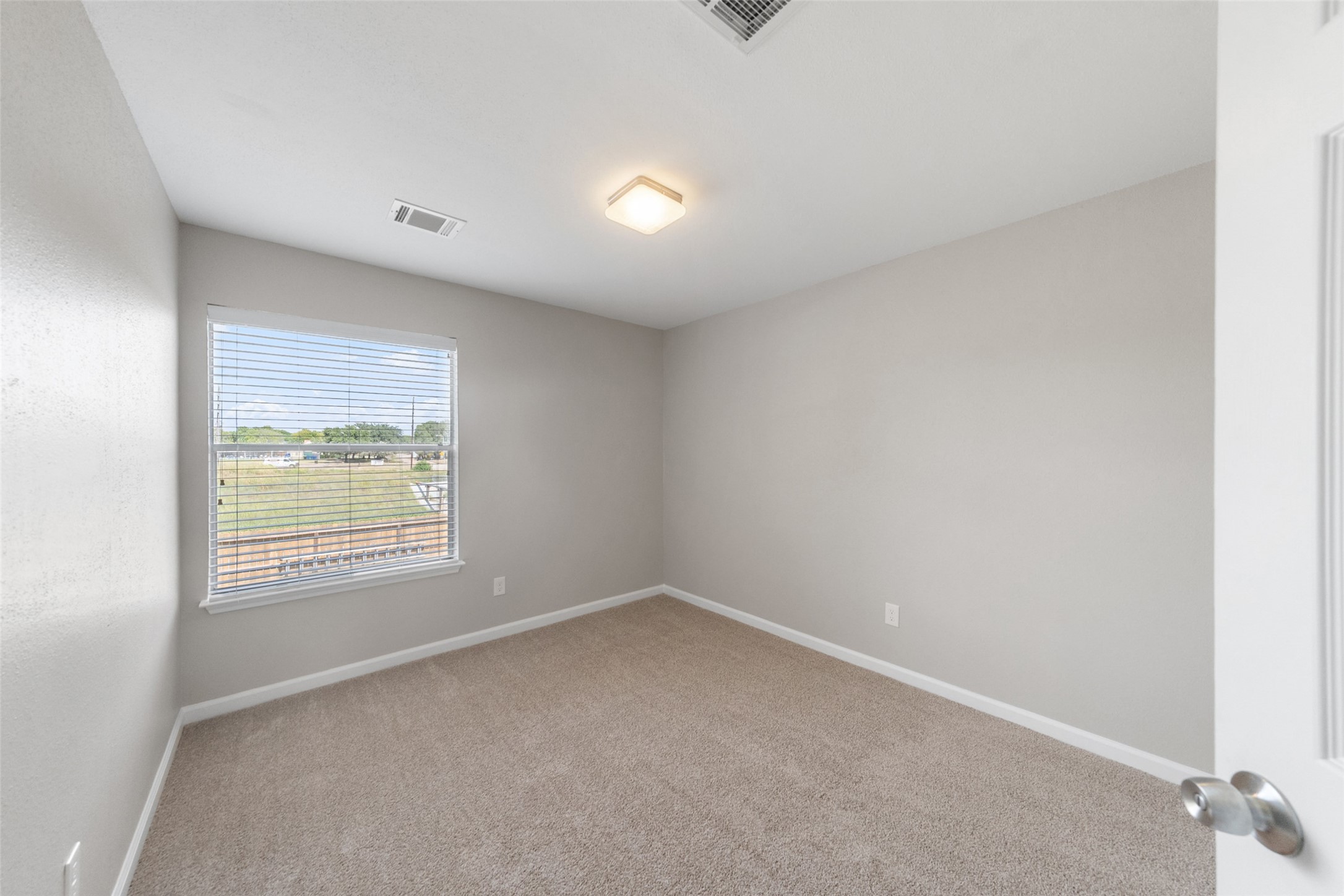 10402 Trading Post Drive Houston, TX 77064 - Photo 18 of 43 an empty room with a window