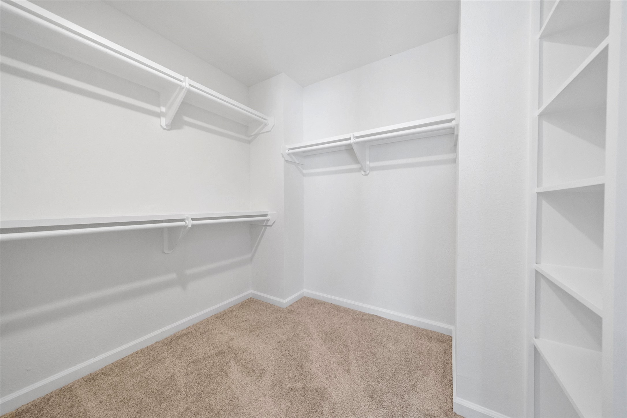 10402 Trading Post Drive Houston, TX 77064 - Photo 22 of 43 a view of an empty walk in closet